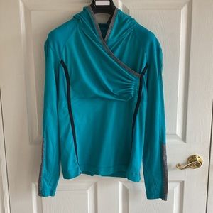 Lululemon size 12 pullover hoodie.Turquoise color with black and grey detailing